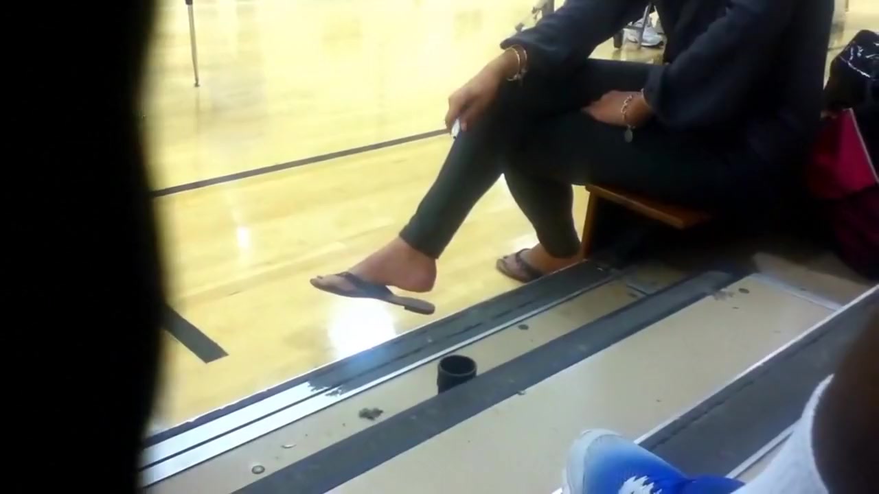 Milf dangling flip flops