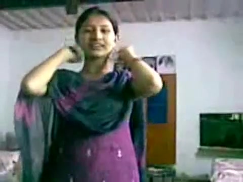 Divya Mol in Violet Dress