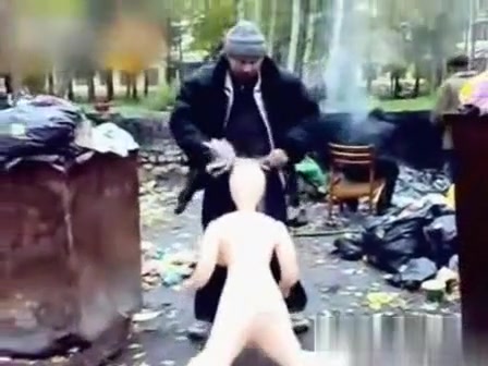 Homeless boy copulates plastic sex doll