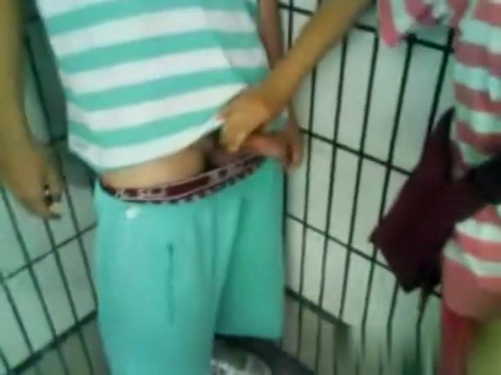 Horny gal jerking me off in the public lavatory